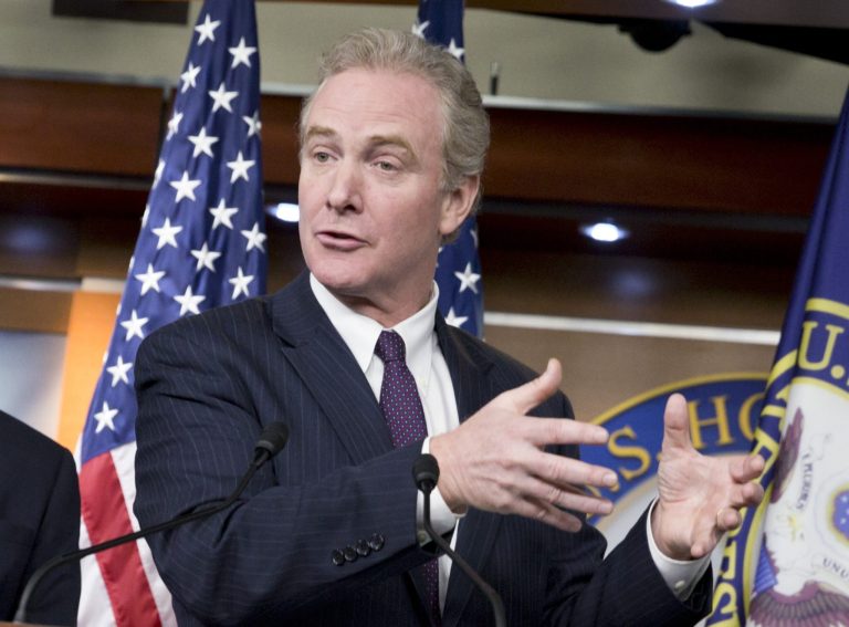Rep. Chris Van Hollen, D-Md., the ranking member of the House Budget Committee, center, said he signed off on the $6 billion increase for new federal employees hired beginning in January after Obama assured him he would propose no new retirement benefit cuts in next yearâs budget. (AP Photo/J. Scott Applewhite)