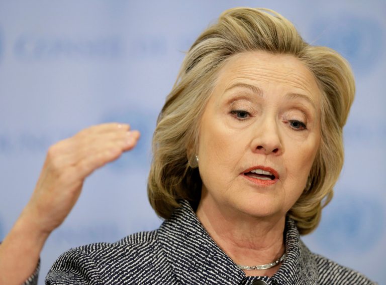 Top intelligence officials are walking back their claim that Hillary Clinton's private emails contained information classified up to 