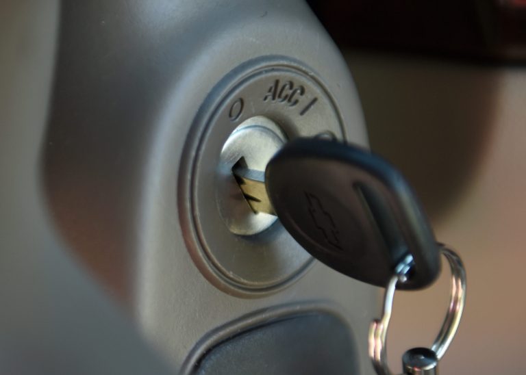 FILE - This Tuesday, April 1, 2014, file photo, shows a key in the ignition switch of a 2005 Chevrolet Cobalt in Alexandria, Va. Despite recall notices, thousands of news stories, highly publicized congressional hearings and two federal investigations, fewer than half of the roughly 2.36 million people still driving Chevy Cobalts, Saturn Ions and other small cars with defective and potentially deadly ignition switches have had them replaced. (AP Photo/Molly Riley, File)