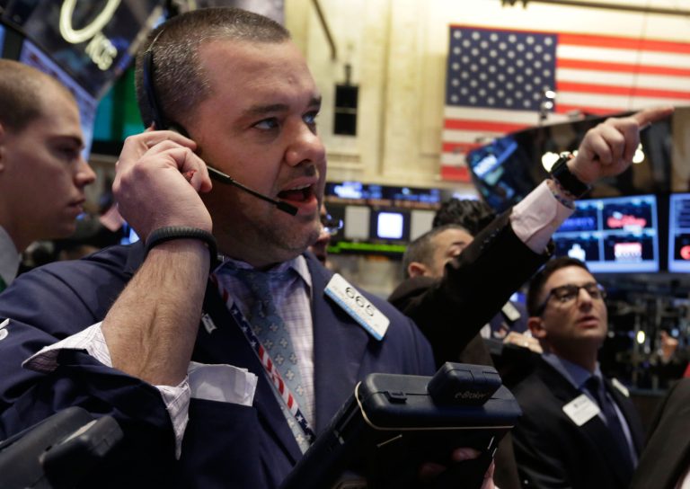 Trader Kevin Lodewick works on the floor of the New York Stock Exchange Tuesday, Feb. 4, 2014. Stocks are mixed on Wall Street after suffering big losses the day before. (AP Photo/Richard Drew)