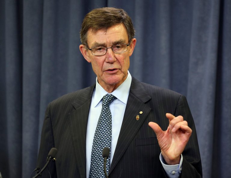 FILE - In this April 6, 2014 file photo, retired Australian Air Chief Marshall Angus Houston speaks to the media during a press conference about the ongoing search operations for the missing Malaysia Airlines Flight 370 in Perth, Australia. Houston, who is overseeing the search for the missing Malaysia Airlines plane, said Monday, April 7, 2014,  underwater sounds picked up by equipment on an Australian navy ship are consistent with transmissions from black box recorders on a plane. (AP Photo/Rob Griffith, File)