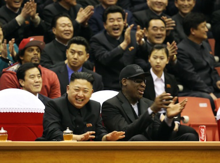 This undated publicity image released by HBO shows former NBA basketball player Dennis Rodman, right, with North Korea's Kim Jong Un at a basketball game from an episode of the documentary series 
