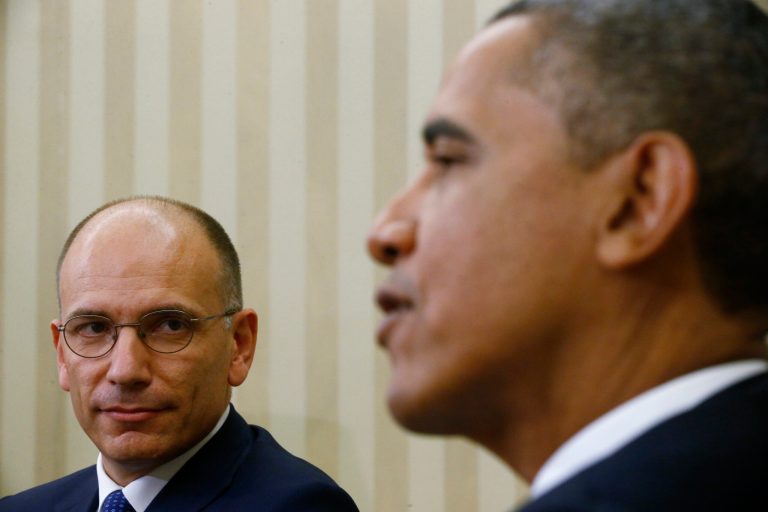 Italy's Prime Minister Enrico Letta, left, looks towards President Barack Obama as he makes a statement to reporters in the Oval Office at the White House in Washington, Thursday, Oct. 17, 2013. The leaders discussed trade and investment, NATO, North Africa, and the Middle East during their bilateral meeting. (AP Photo/Charles Dharapak)