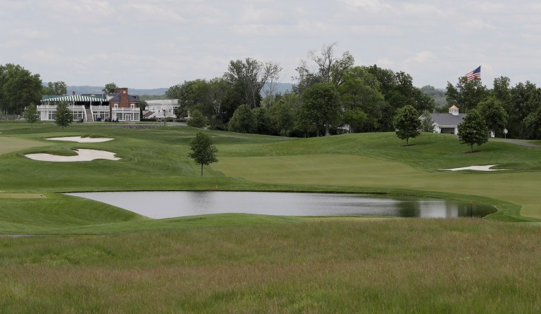 A man has been arrested and charged with criminal mischief in connection to damages to Trump's golf club in New Jersey. (AP Photo/Julio Cortez)