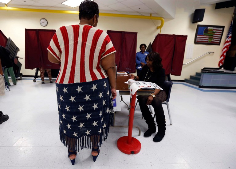 The Electoral College can only be justified if, sometimes, it is appropriate for a candidate to win the presidency without winning the popular vote. (AP Photo/Gerald Herbert)