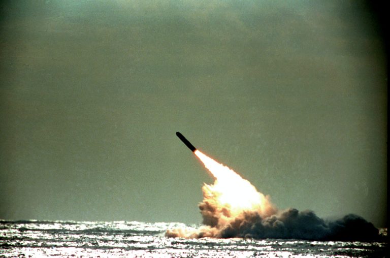 The U.S. Navy launches a Trident II, D-5 missile from the submerged submarine USS Tennessee in the Atlantic Ocean off the coast of Florida, on Dec. 4, 1989. (AP Photo/Phil Sandlin)