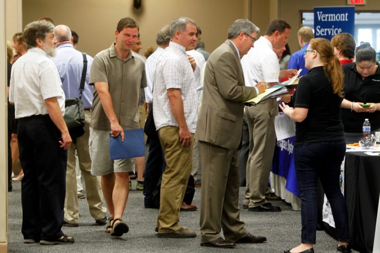   FILE - This July 15, 2013 photo, people line up at the job fair in South Burlington, Vt. The 162,000 jobs the economy added in July were a disappointment. The quality of the jobs was even worse. A disproportionate number of the added jobs were part-time or low-paying, or both. Part-time work accounted for more than 65 percent of the positions employers added in July. Low-paying retailers, restaurants and bars supplied more than half July's job gain. (AP Photo/Toby Talbot)  