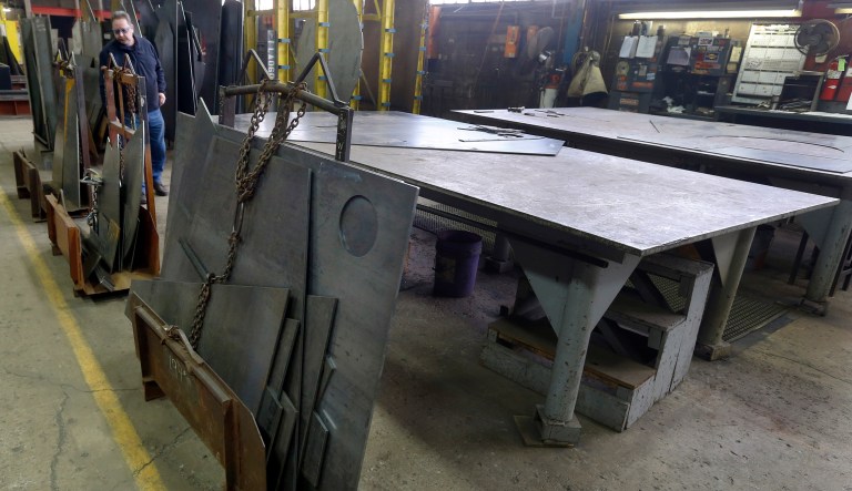 In this 2015 photo, cut panels of steel used to make blades to build fans for industrial ventilation systems are stored on the production floor at the Robinson Fans Inc. plant in Harmony, Pa. On Friday, the Steel Manufacturers Association praised a report from the Trump administration that called for tariffs on steel imports. (AP Photo/Keith Srakocic)