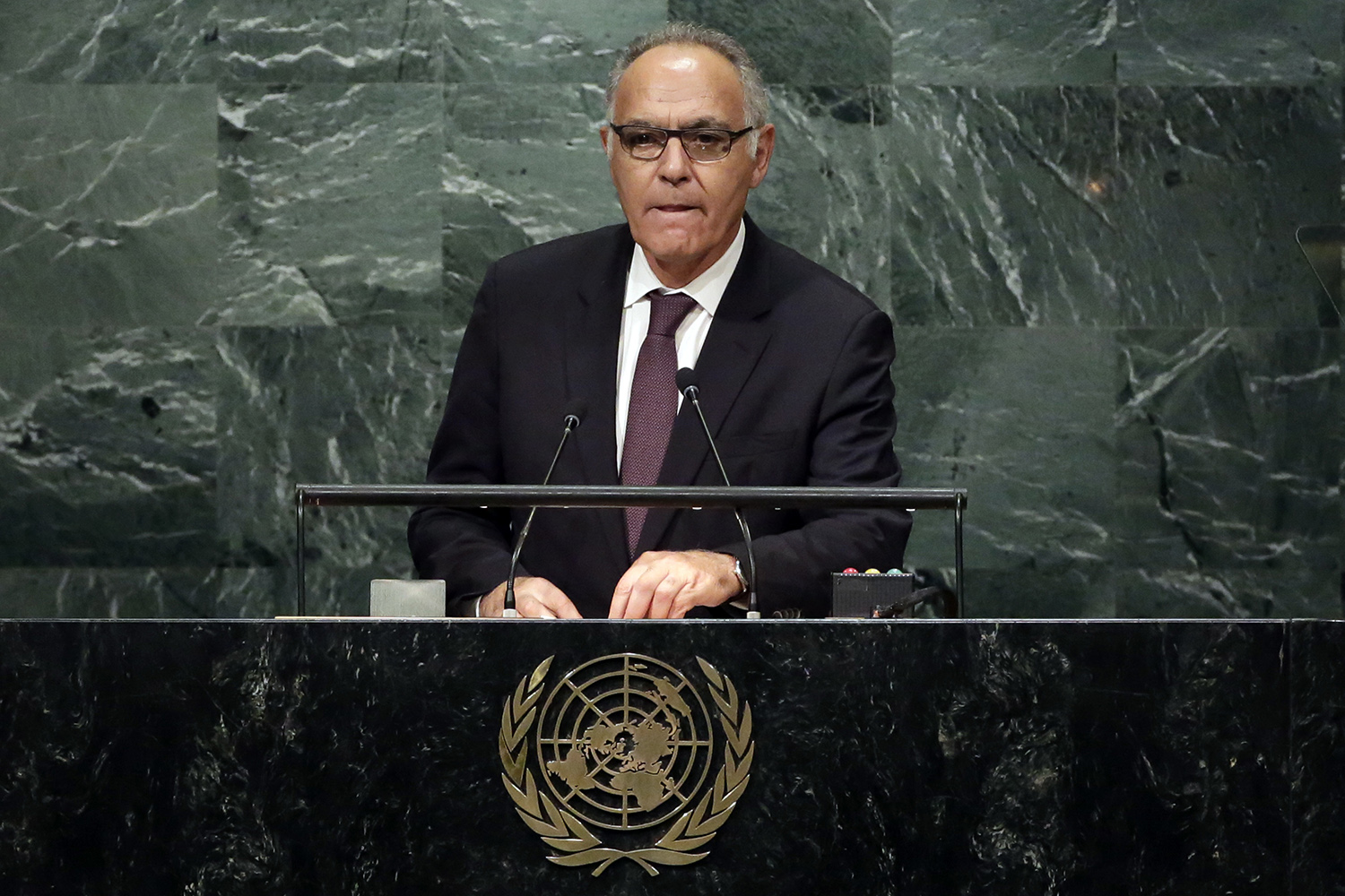UN climate chief extends olive branch to Trump