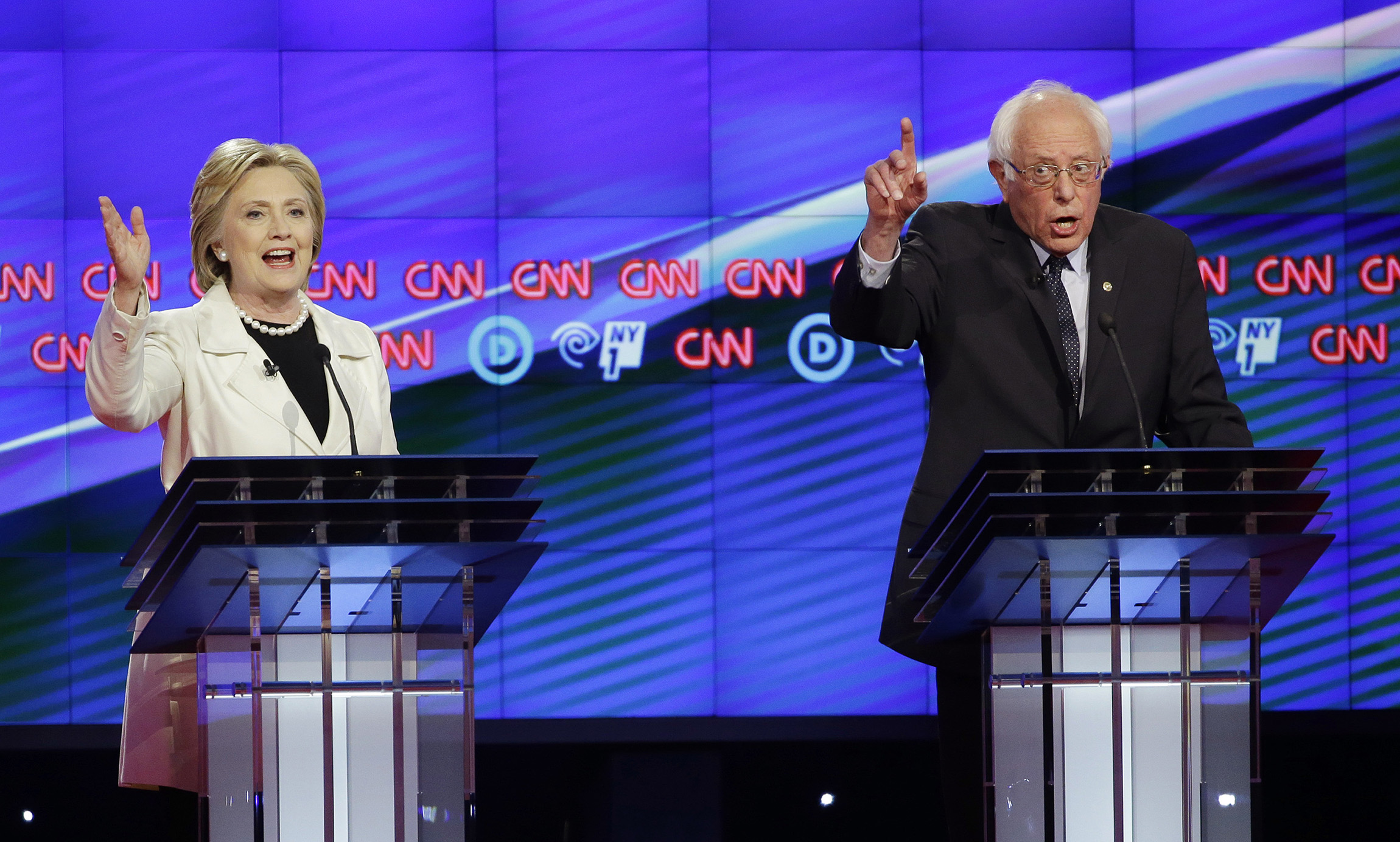 Dem debate gets loud, Clinton-Sanders race gets heated