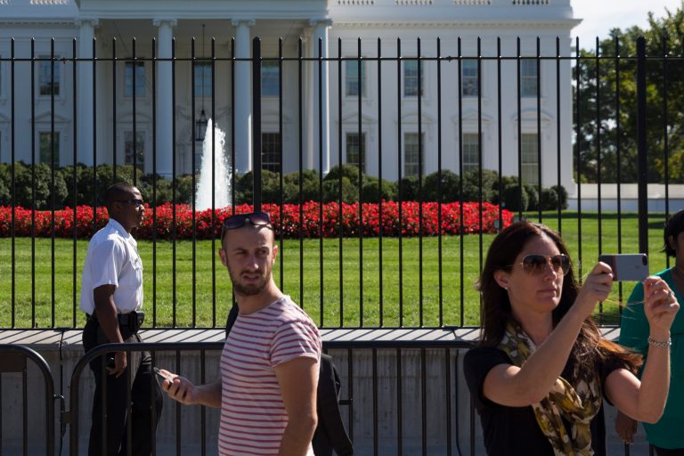 FILE - In this Sept. 22, 2014, file photo, a Uniformed Secret Service police officer stands outside the White House in Washington. The intruder who climbed a fence made it farther inside the White House than the Secret Service has publicly acknowledged, the Washington Post and New York Times newspapers reported Monday, Sept. 29. The disclosures came on the eve of a congressional oversight hearing with the director of the embattled agency assigned to protect the president's life. (AP Photo/Evan Vucci, File)