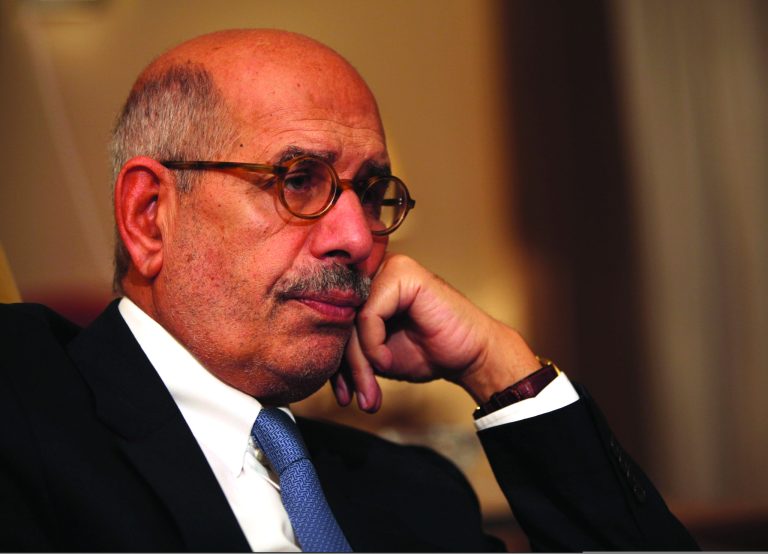 FILE - In this Saturday, Nov. 24, 2013 file photo, leading democracy advocate Mohammed ElBaradei speaks to a handful of journalists including the Associated Press, at his home on the outskirts of Cairo, Egypt. Security was beefed up around Egypt's opposition leaders on Thursday, Feb. 7, 2013 after several hardline Muslim clerics issued religious edicts calling for them to be killed, raising fears of assassinations similar to that of a Tunisian opposition leader gunned down a day earlier. A security official said ElBaradei's home and several other leaders' homes will be put under observation for their protection.(AP Photo/Thomas Hartwell, File)