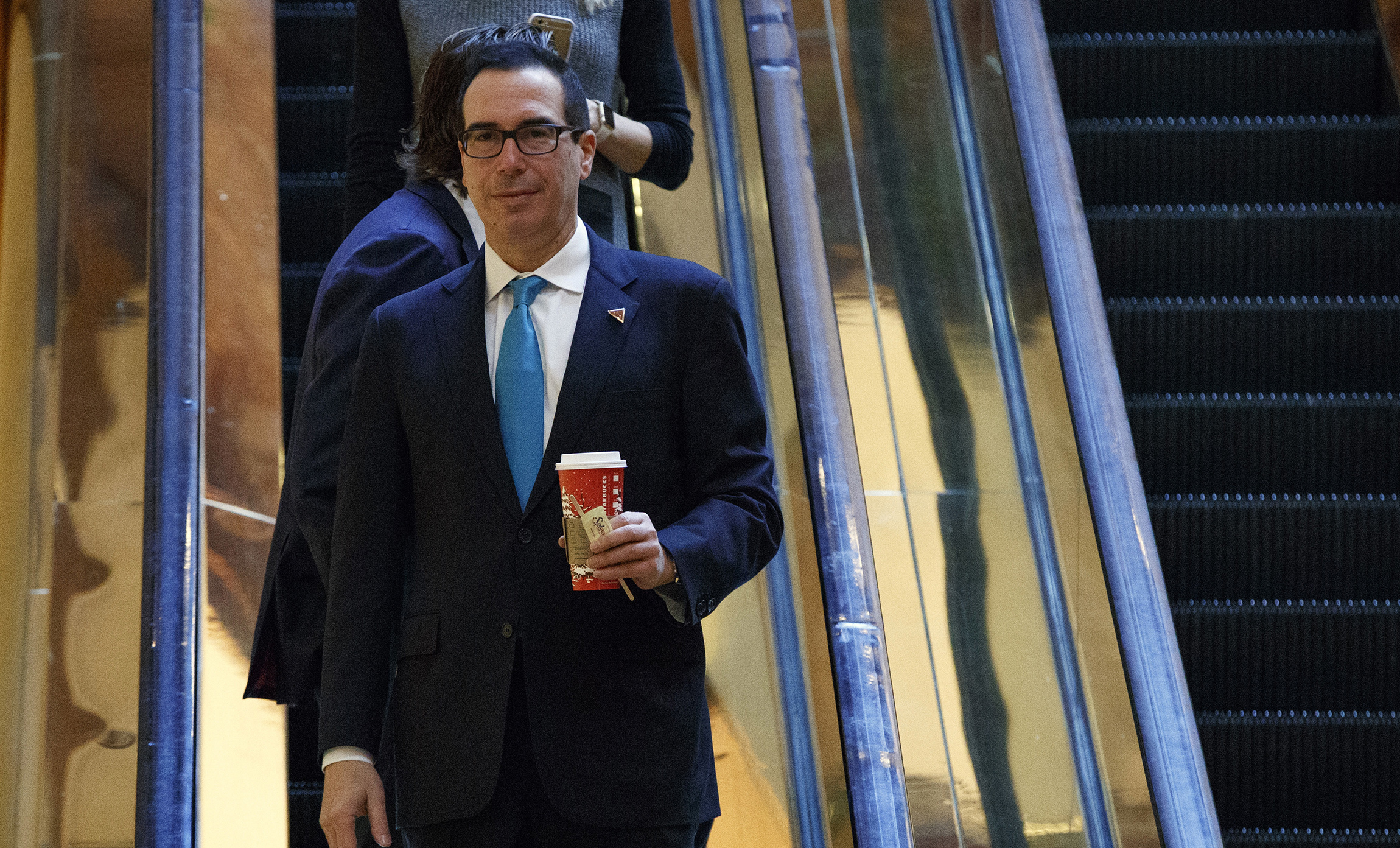 Liberal groups launch air war pressing Flake, Heller to oppose Mnuchin