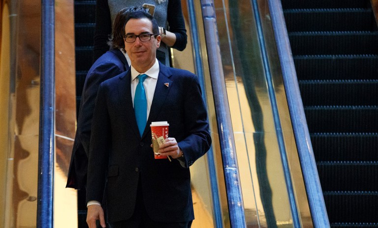 The liberal interest group Allied Progress launched a six-figure advertising buy this week in a bid to pressure Republicans to oppose President-elect-Trump's pick for treasury secretary, Steven Mnuchin. (AP Photo/Evan Vucci)