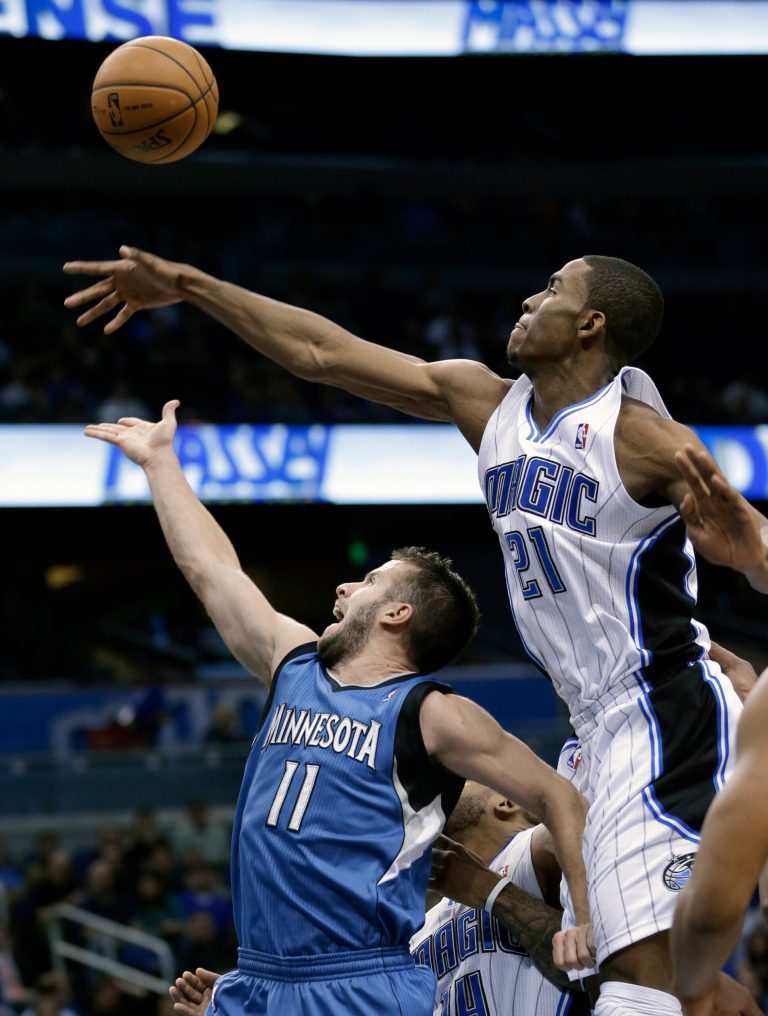   Minnesota Timberwolves' Jose Barea (11) takes a shot in front of Orlando Magic's Moe Harkless (21) during the first half of an NBA basketball game, Monday, Dec. 17, 2012, in Orlando, Fla. (AP Photo/John Raoux)  