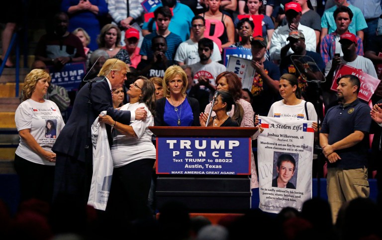 Donald Trump broke briefly from a prepared address Tuesday evening in Austin, Texas, to bring the families of Americans killed by illegal immigrants on stage to give their testimony. (AP Photo/Gerald Herbert)