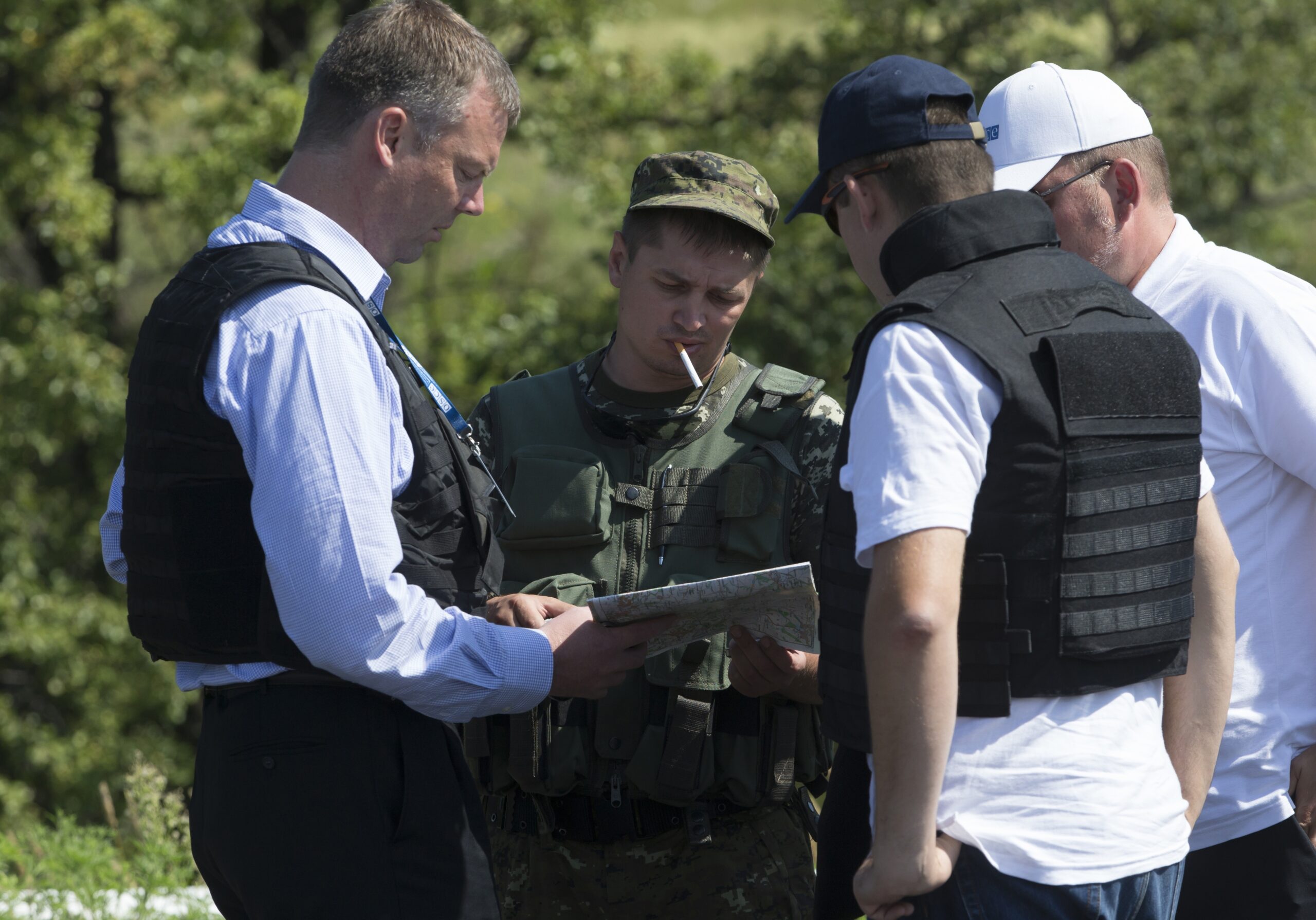 Clashes prevent experts from reaching bodies