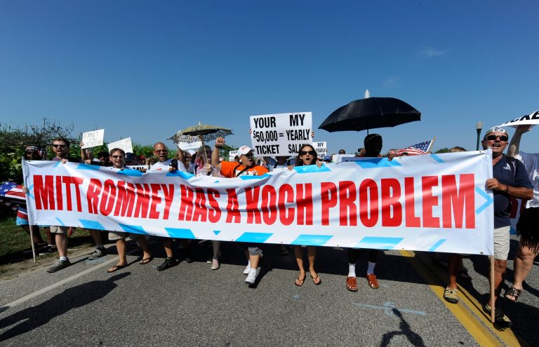 Attacks on the Koch brothers included death threats, said a company lawyer. (AP Photo/Kathy Kmonicek)