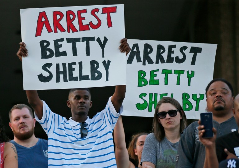 President Obama called the mayors of Tulsa and Charlotte, N.C. Wednesday to discuss the shooting deaths of two black men by police this week and the outbreak of protests in both cities. (AP Photo/Sue Ogrocki)
