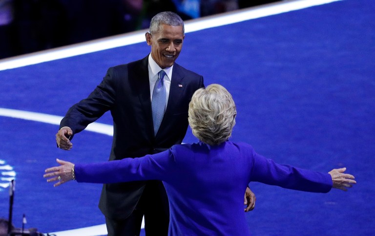 A vote for Hillary Clinton, in President Obama's view, is a vote to continue his policies. (AP Photo/John Locher)