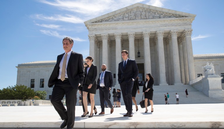 Federal courts in Hawaii and Maryland in October halted implementation of Trump's newest guidance. (AP Photo/J. Scott Applewhite)