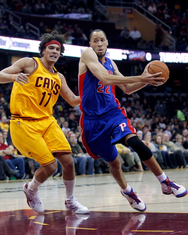  Detroit Pistons' Tayshaun Prince (22) drives past Cleveland Cavaliers' Anderson Varejao (17), from Brazil, during the first quarter of an NBA basketball game Saturday, Dec. 8, 2012, in Cleveland. (AP Photo/Tony Dejak)  