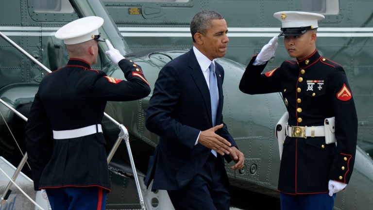   President Barack Obama walks off the Marine One helicopter as he heads to Air Force One at Andrews Air Force Base Md., Tuesday, Aug. 6, 2013. Obama is traveling to Arizona and California. (AP Photo/Susan Walsh)  