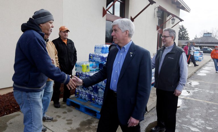 Michigan Gov. Rick Snyder, center, has told the House he won't testify before an all-Democratic committee investigating the Flint water crisis. (AP Photo/Carlos Osorio)