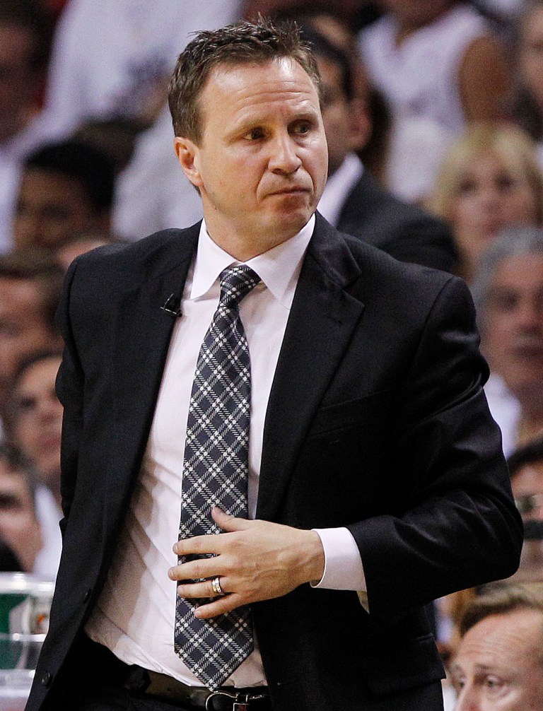   Oklahoma City Thunder head coach Scott Brooks walks down the floor at a break during the first half at Game 3 of the NBA Finals basketball series against the Miami Heat, Sunday, June 17, 2012, in Miami. (AP Photo/Lynne Sladky)  