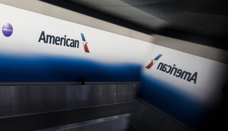 The Communications Workers of America says it is responsible for a $1,000 bonus American Airlines employees are set to receive. The company, though, has said that bonus is a product of the new GOP tax law. (Jeenah Moon/Bloomberg)