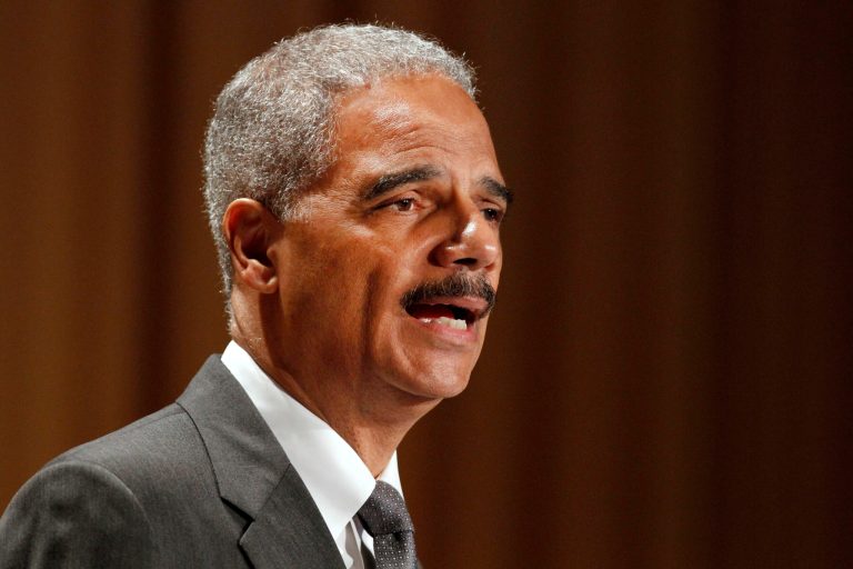   Attorney General Eric Holder speaks at the League of Women Voters National Convention in Washington, Monday, June 11, 2012. A House committee looking into a flawed gun-smuggling probe in Arizona announced Monday that it will consider holding Holder in contempt of Congress next week for failing to produce some documents the panel is seeking. (AP Photo/Jacquelyn Martin)  
