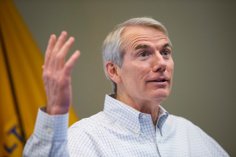 Sen. Rob Portman, R-Ohio, is flexing his cash advantage over Democratic challenger Ted Strickland by snapping up prime TV air time now for ads he'll run across Ohio through Election Day. (AP Photo/John Minchillo, File)