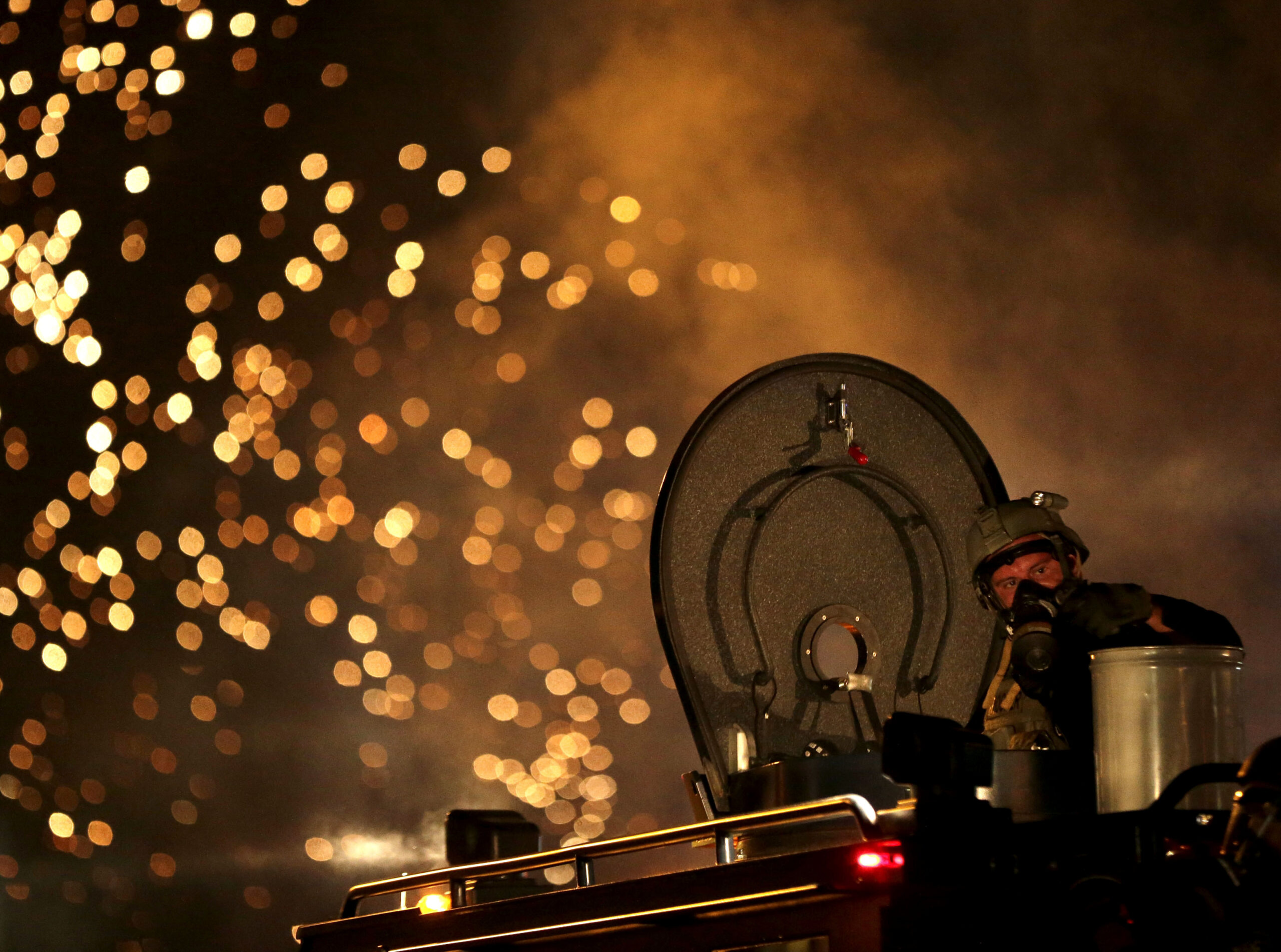 Obama orders review of U.S. arming of police