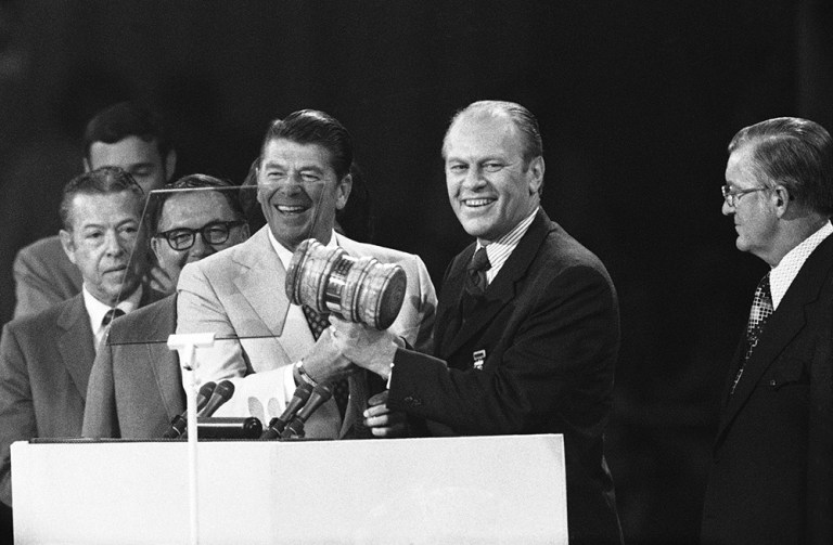 Gov. Ronald Reagan of California, temporary chairman of the RNC, turns the gavel over to the permanent chairman, Rep. Gerald R. Ford in 1972. in 1976 President Gerald Ford swayed the rules committee to make it easier for him to prevail over Ronald Reagan during the Kansas City convention. (AP Photo)