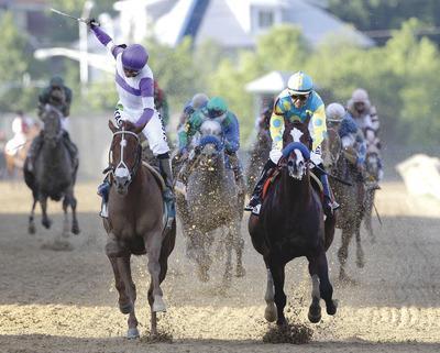 Patrick Semansky/APKentucky Derby winner I'll Have Another passed Bodemeister in the final yards to claim the Preakness Stakes on Saturday.