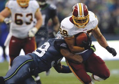 Jonathan Ferrey/Getty Images
Roy Helu finished with 108 yards and a touchdown on 23 carries and caught seven passes for 54 yards in the Redskins'win.