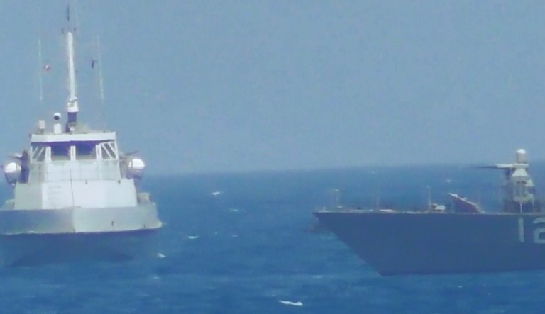 After the warning shots were fired, the Iranian vessel halted its unsafe approach. (CENTCOM)