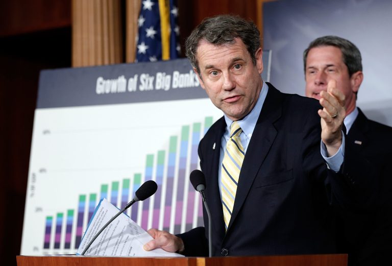 Sen. Sherrod Brown, D-OH, (L)Â has scheduled a Nov. 21 hearing to look into secret tapes that showed regulators at the Federal Reserve Bank of New York disagreeing over supervision of Goldman Sachs.Â (Photo by Win McNamee/Getty images)