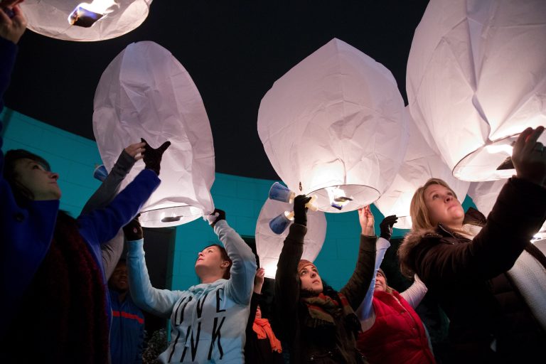 Attendees release paper lanterns during a vigil for victims of the Sandy Hook School shooting, Sunday, Dec. 16, 2012, in Omaha Neb. A gunman walked into the elementary school in Newtown, Conn., Friday and opened fire, killing 26 people, including 20 children. (AP Photo/The Omaha World-Herald, Rebecca S. Gratz) MAGS OUT; ALL NEBRASKA LOCAL BROADCAST, TV OUT.
