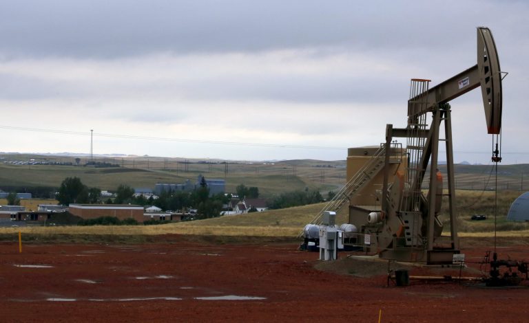 While some of those who voted against the bill raised concerns about the impacts of lifting the export ban on oil refineries and on domestic shipping, all of those who spoke against the bill mentioned climate change as a mitigating factor. (AP Photo/Martha Irvine)