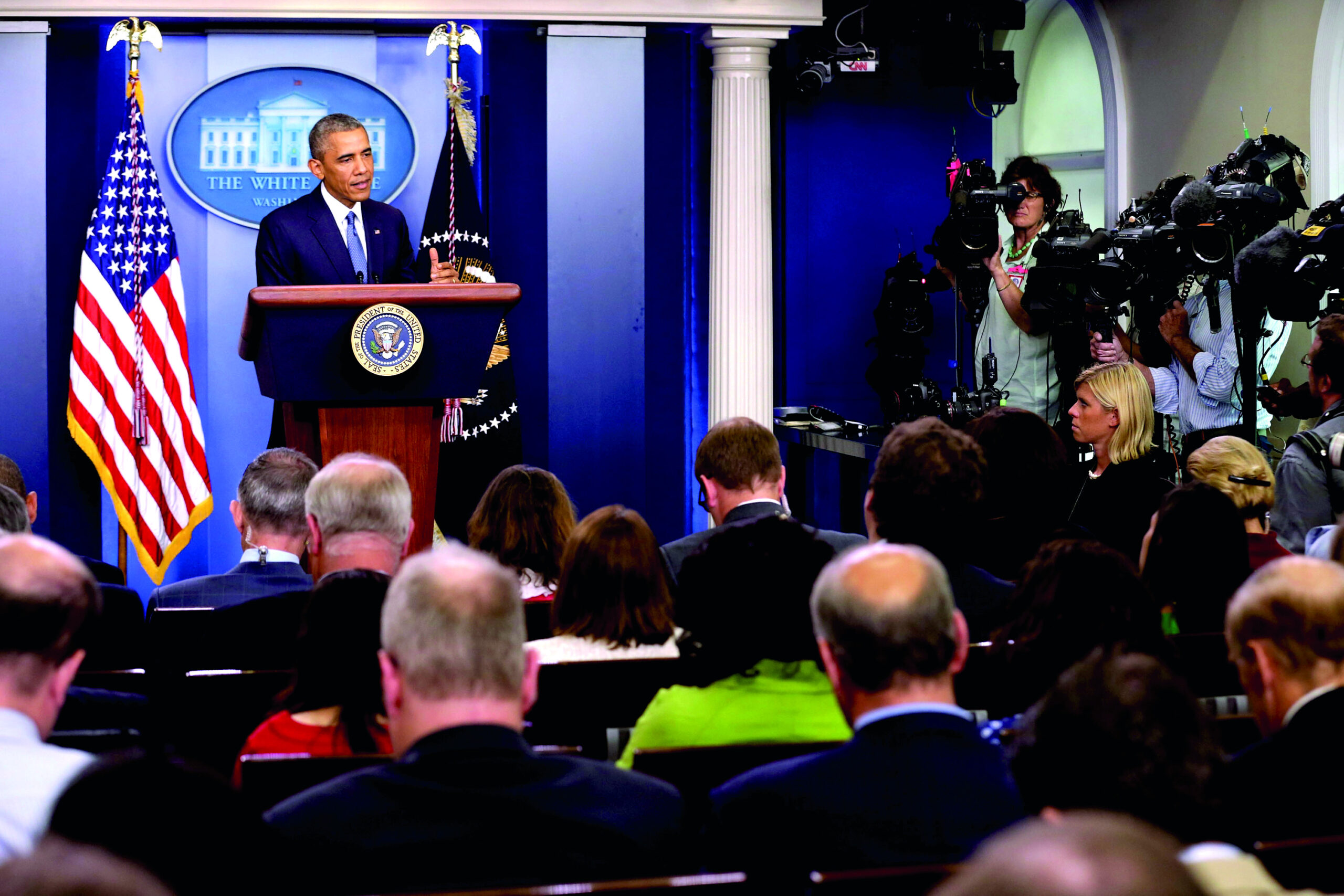 Absent Obama will play starring role on campaign trail anyway