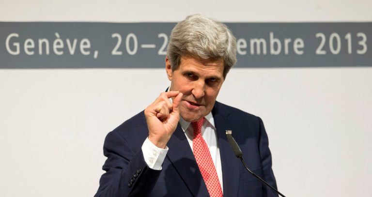 U.S. Secretary of State John Kerry gestures as he speaks to the media about the deal that has been reached between six world powers and Iran that calls on Tehran to limit its nuclear activities in return for sanctions relief, at the International Conference Centre of Geneva, Sunday, Nov. 24, 2013, in Geneva, Switzerland. (AP Photo/Carolyn Kaster, Pool)