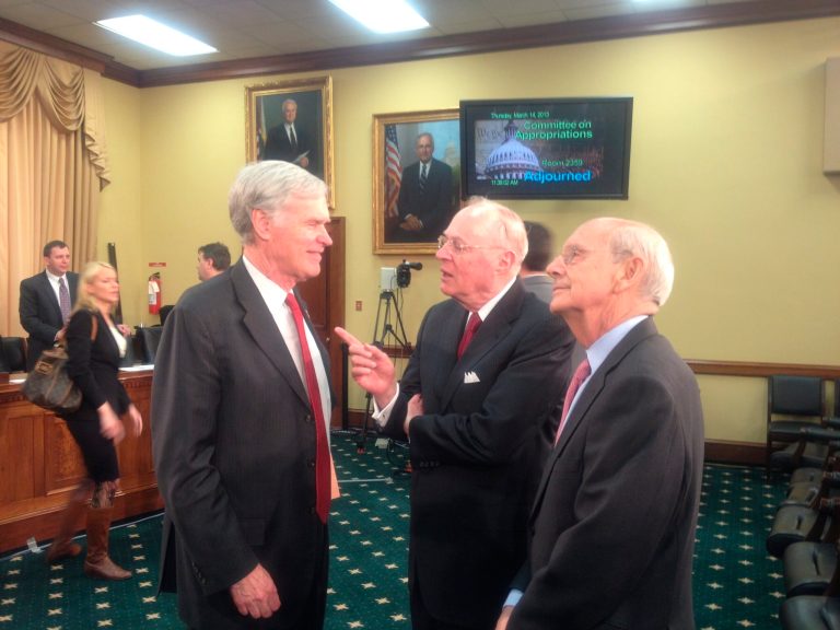 Justices Anthony Kennedy, middle, and Stephen Breyer, right, talk with Rep. Ander Crenshaw, R-Fla. at Thursday's appropriations hearing.