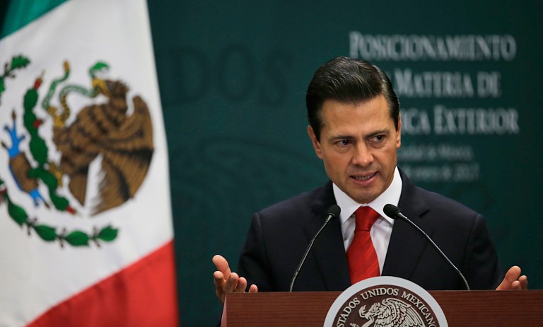 An official says Mexico's President Enrique Pena Nieto 'considering' canceling trip to Washington following Trump border wall order. (AP Photo/Marco Ugarte)