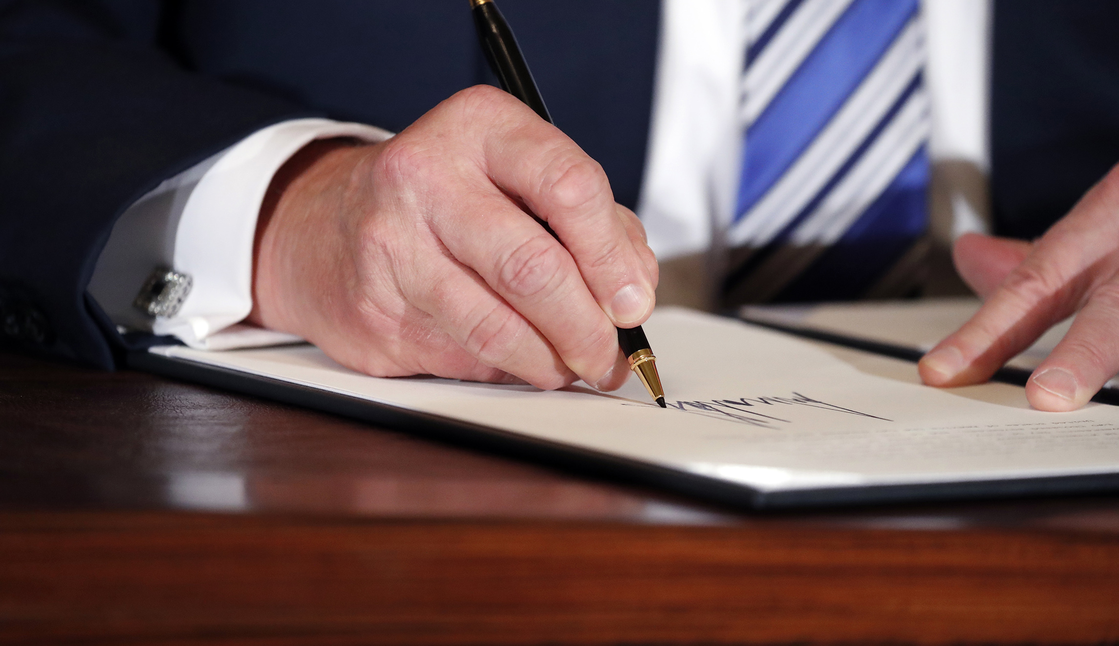 Trump signs $200 million memo boosting computer science education in schools