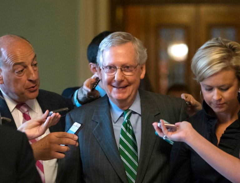 Senate Majority leader Mitch McConnell smiles as he leaves the chamber after announcing the release of the Republicans' healthcare bill which represents the party's long-awaited attempt to scuttle much of President Barack Obama's Affordable Care Act, at the Capitol in Washington, Thursday, June 22, 2017. The measure represents the Senate GOP's effort to achieve a top tier priority for President Donald Trump and virtually all Republican members of Congress. (AP Photo/J. Scott Applewhite)
