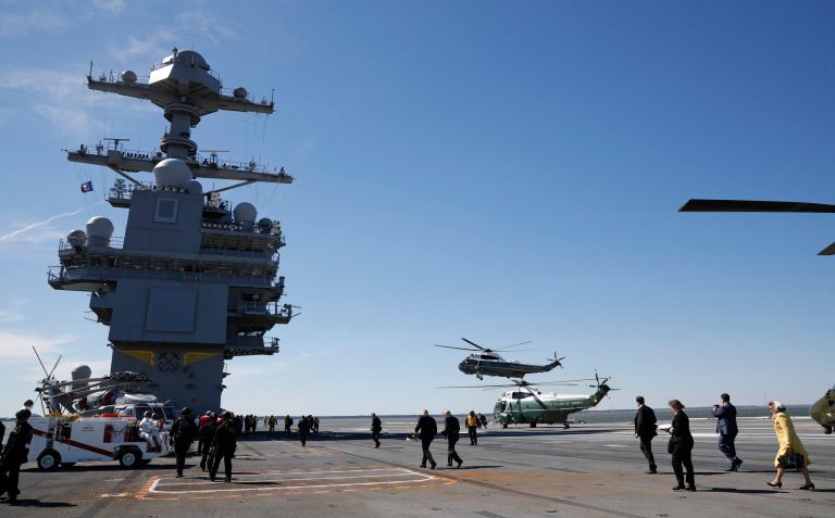 Marine One, with President Donald Trump aboard, lands on nuclear aircraft carrier Gerald R. Ford, at Newport News Shipbuilding in Newport, Va., Thursday, March 2, 2017. Trump traveled to Virginia to meet with sailors and shipbuilders on aircraft carrier which is scheduled to be commissioned this year after cost overruns and delays. (AP Photo/Pablo Martinez Monsivais)