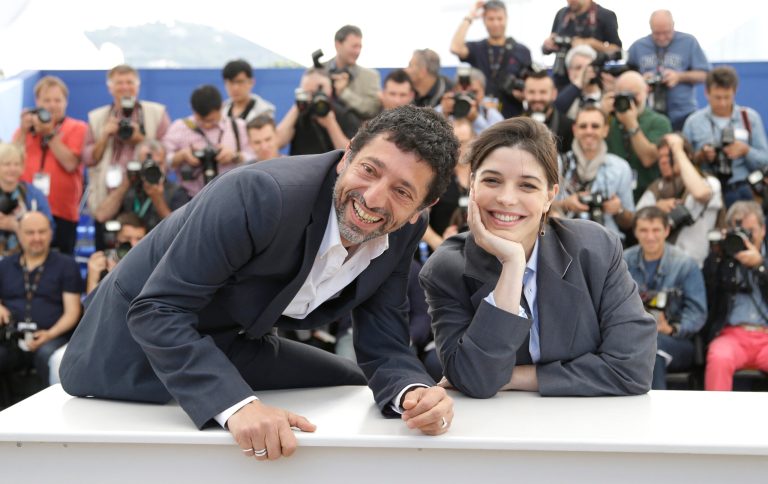 Actor Kamel Abdelli, left, and actress Heloise Godet pose for photographers during a photo call for Goodbye to Language (Adieu au language) at the 67th international film festival, Cannes, southern France, Wednesday, May 21, 2014. (AP Photo/Thibault Camus)