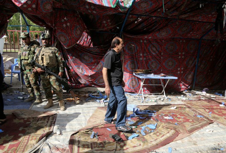 According to Iraqi police, the attack occurred around lunchtime in the Shaab neighborhood. (AP Photo/Karim Kadim)