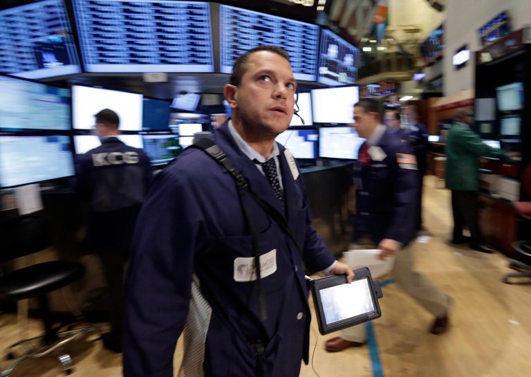 Consumer confidence plunges while other indicators hold up A trader works on the floor of the New York Stock Exchange on Tuesday. (AP Photo/Richard Drew)